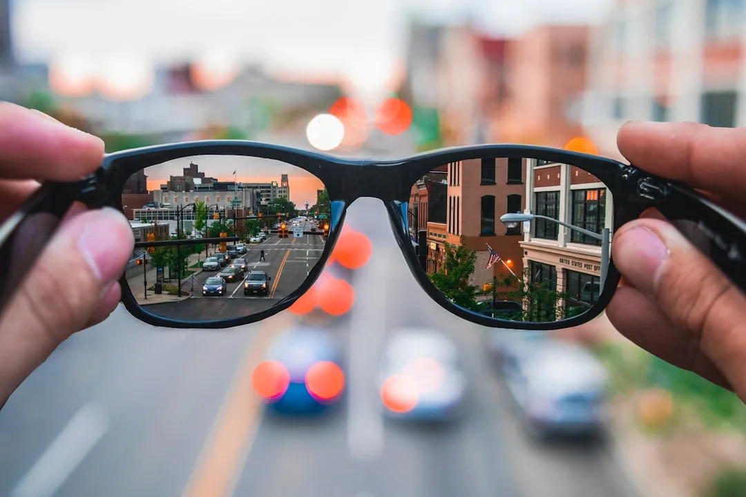 Close-up of adaptive AI glasses lens displaying real-time data overlay