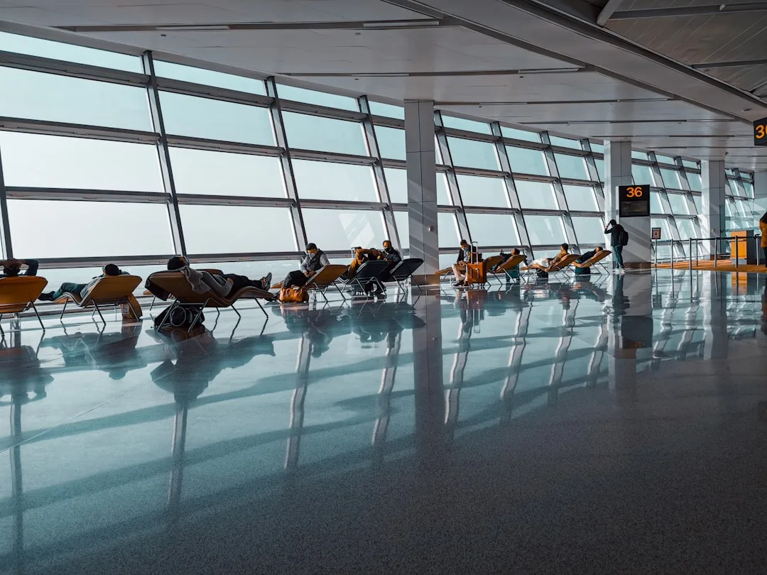 Modern airport lounge with comfortable seating and priority access for travelers detail 1