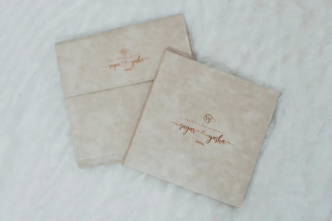 Luxury wedding invitation suite 2026 showing layered materials and dimensional design