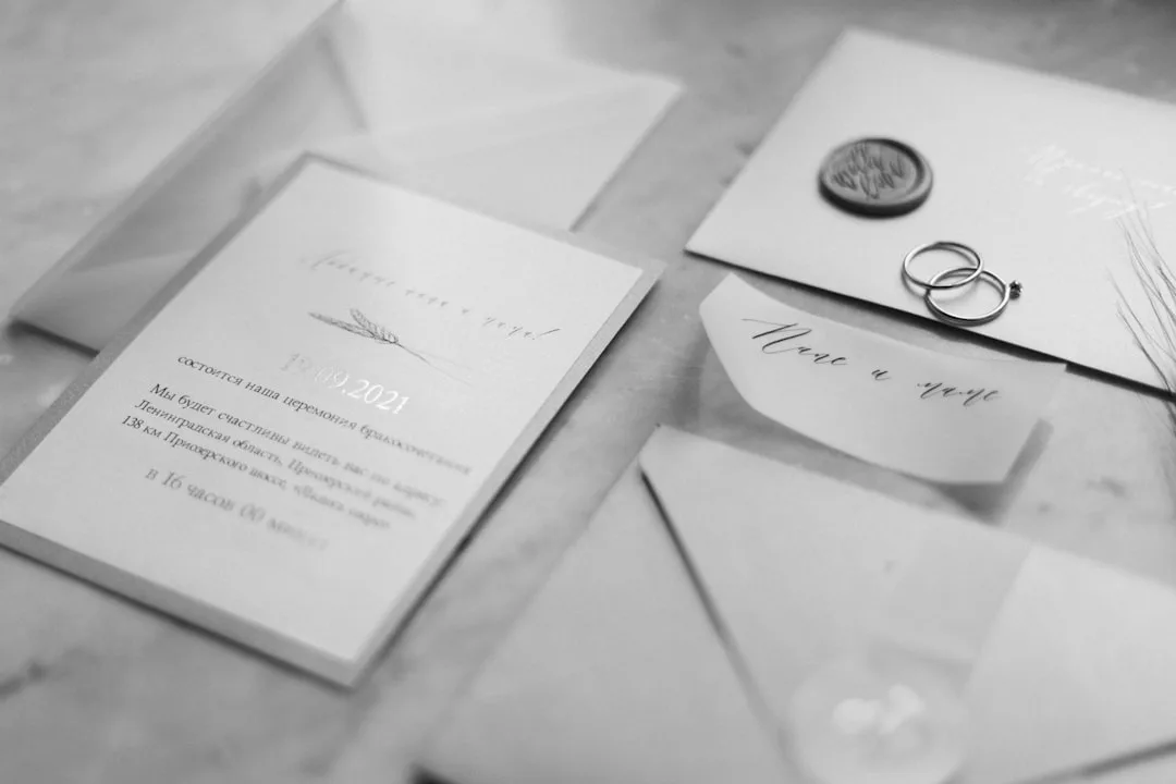 Luxe handwritten invitation with burgundy wax seal and calligraphy addressing detail 4