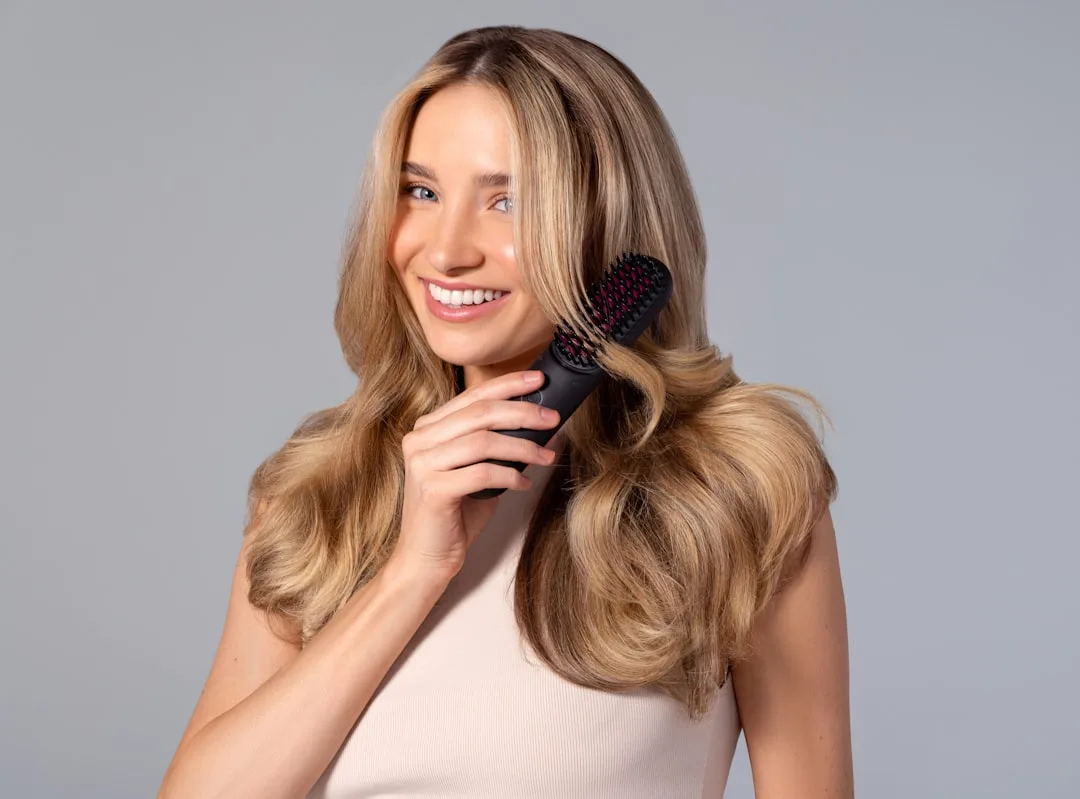 Woman with sleek straight hair trend glossy finish 2026 detail 3