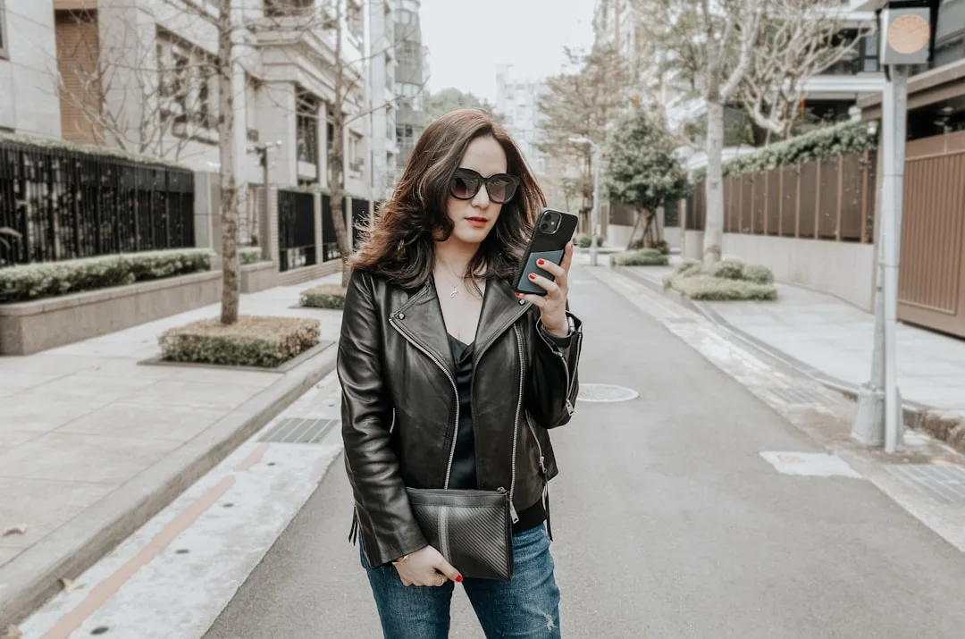 Woman wearing tailored leather jacket with fitted proportions spring 2026 detail 3