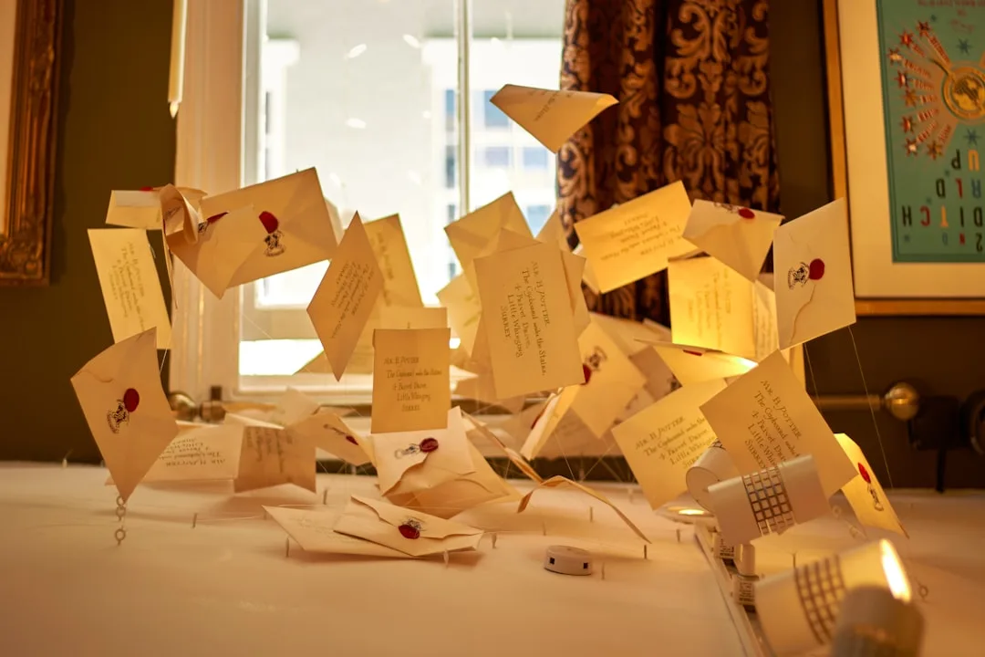 Wooden fingerprint guest tree wedding installation with colorful paint stations