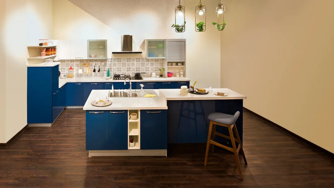 Modular kitchen island with removable cutting board and storage drawer components detail 1