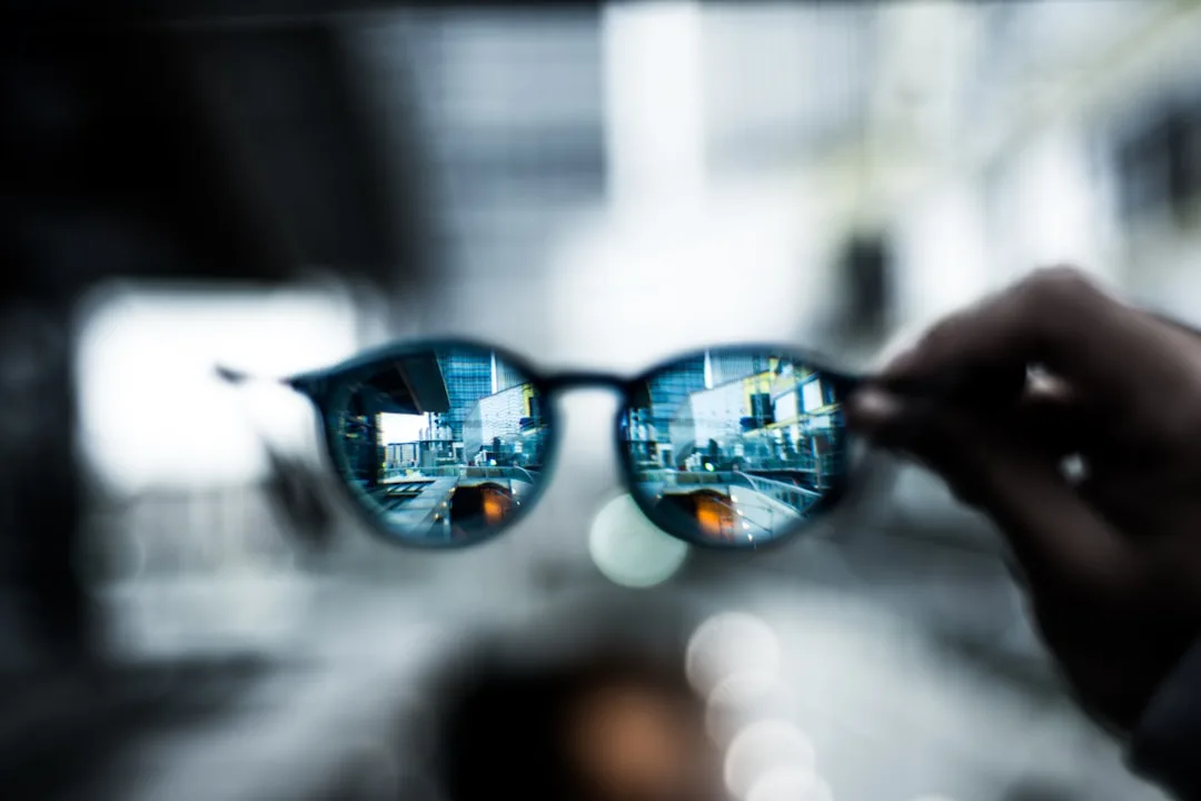 User wearing adaptive AI glasses while navigating urban environment