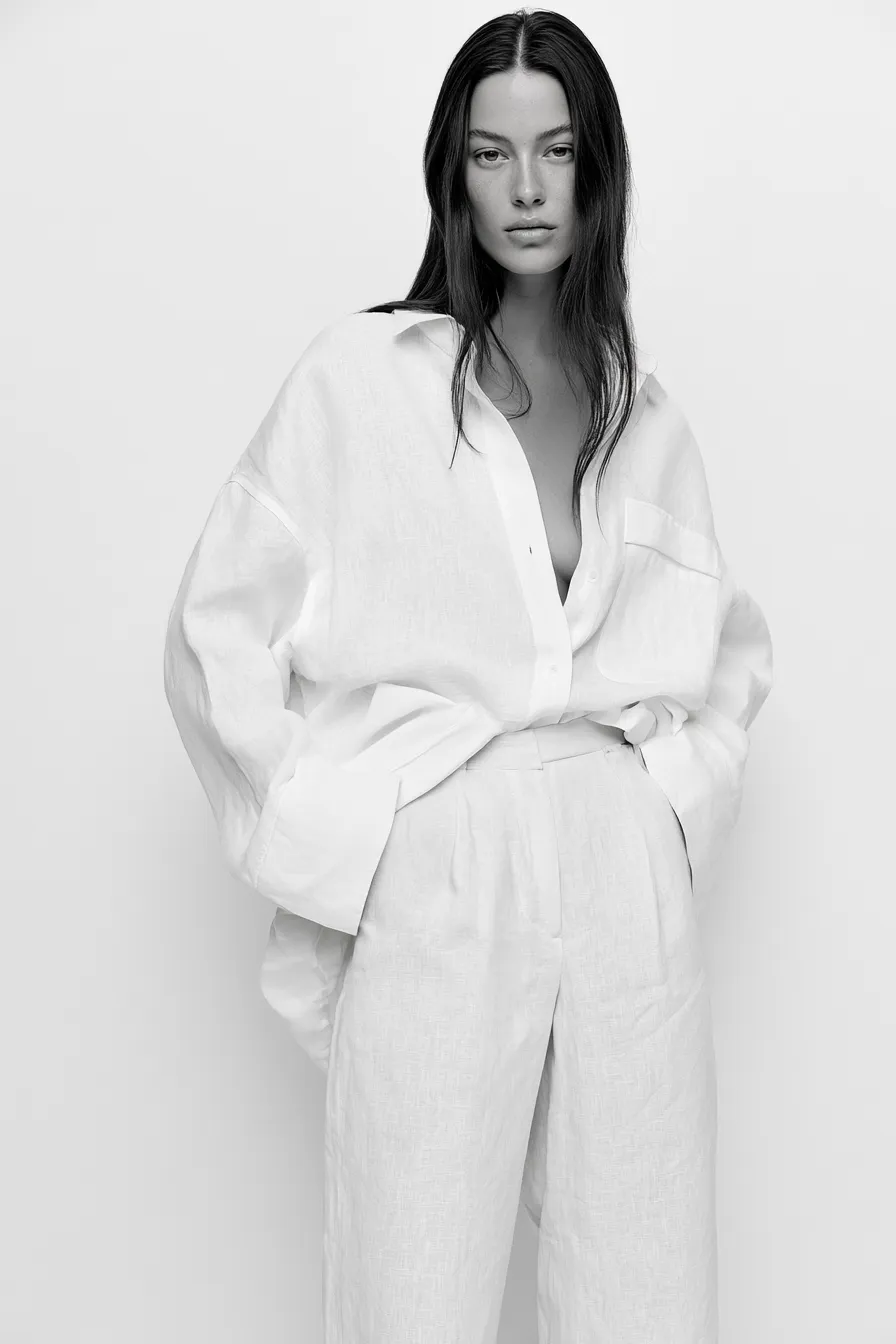 Minimalist chic style with structured linen separates and white background