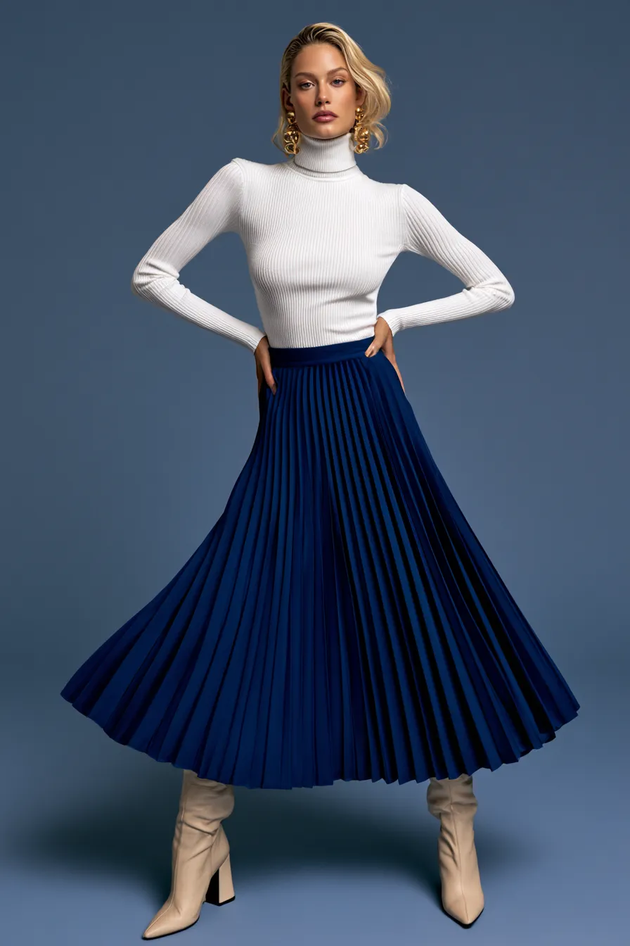 Cobalt blue pleated midi skirt with white turtleneck — skirt outfit ideas for autumn