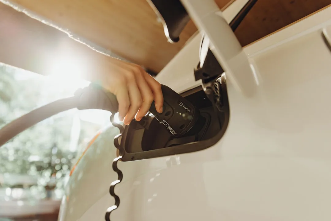 Electric vehicle connected to home battery system with grid connection visualization