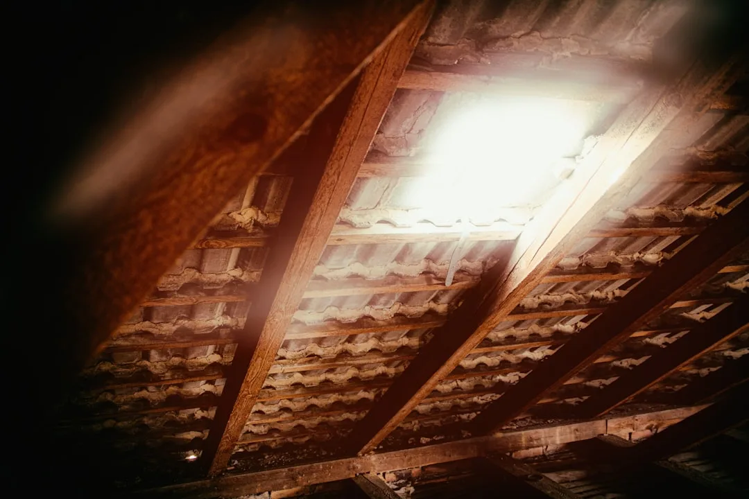 Attic ventilation baffle showing proper airflow management during insulation installation