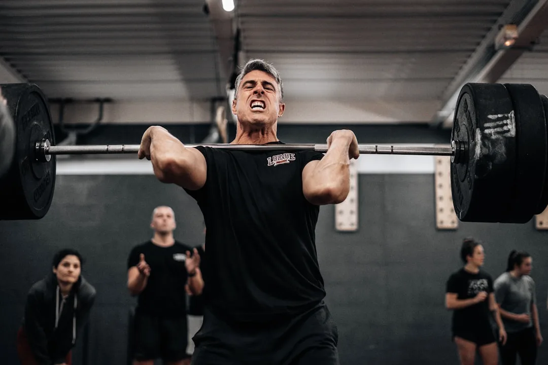Trainer measuring client progress through performance metrics rather than scale weight