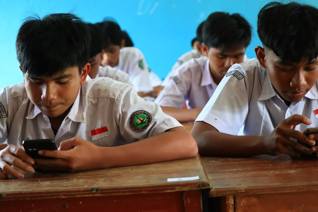 High school students engaged in classroom learning without cell phone distractions modern education