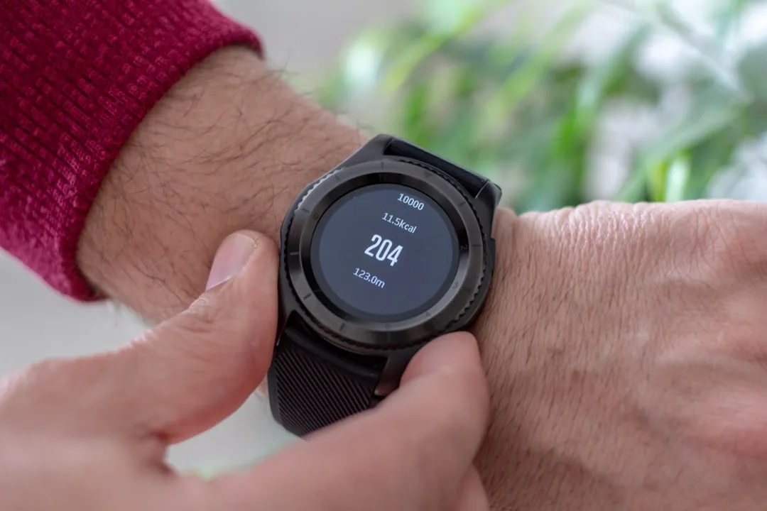 Person wearing advanced sleep tracking band during night sleep with app dashboard