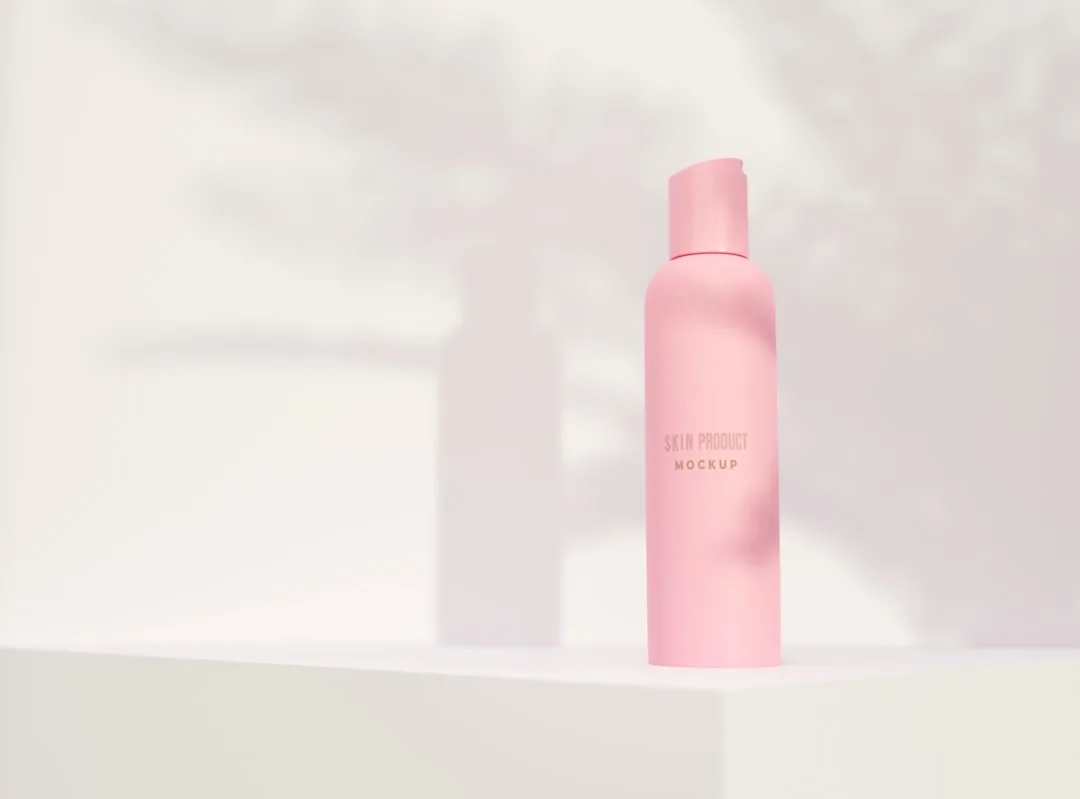 Woman applying hydrating face mist spray over makeup for skin hydration detail 2