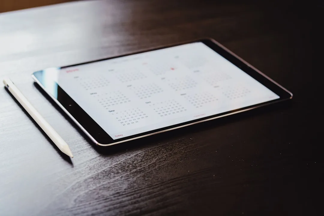 Co-parenting digital calendar showing custody schedule and school events synchronized detail 3