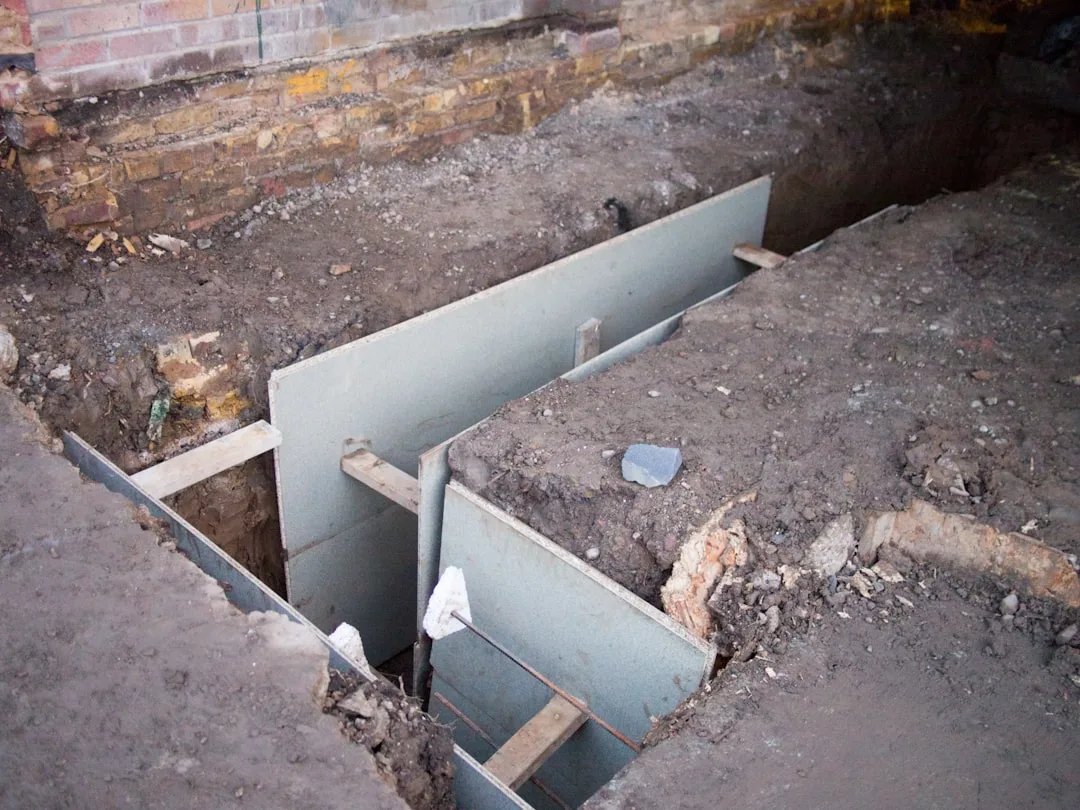 Smart sump pump installation showing dual pump redundancy and battery backup