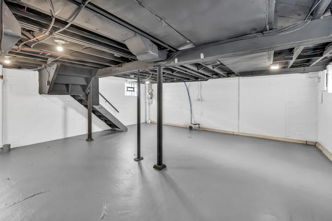 Dehumidifier and moisture monitor in finished basement space