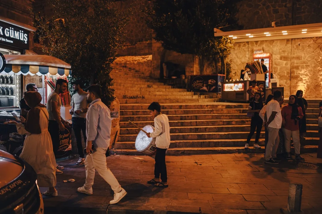 people arriving at evening celebration timing — perspective 3