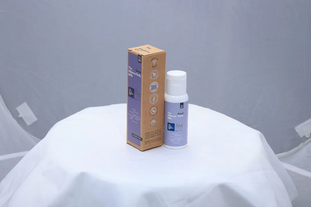 Person applying lightweight barrier repair serum to clean face skin
