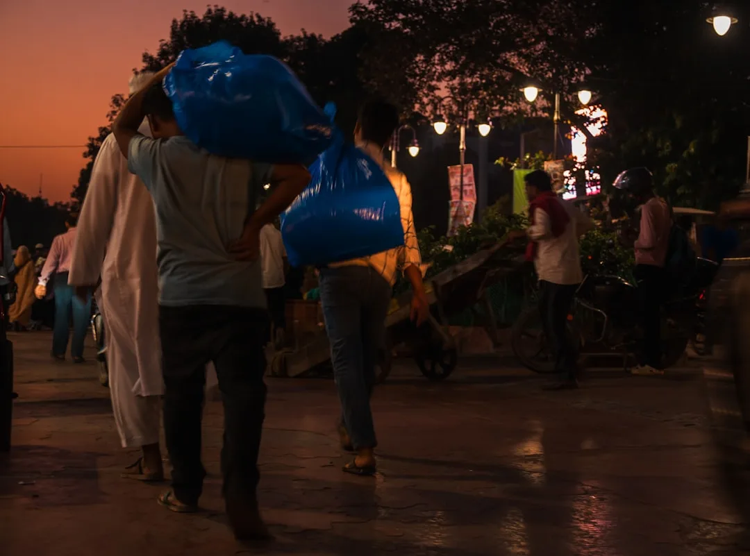 people arriving at evening celebration timing — perspective 1