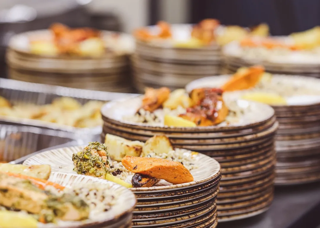 Eco-friendly event catering with reusable dinnerware and local sourcing displayed detail 2
