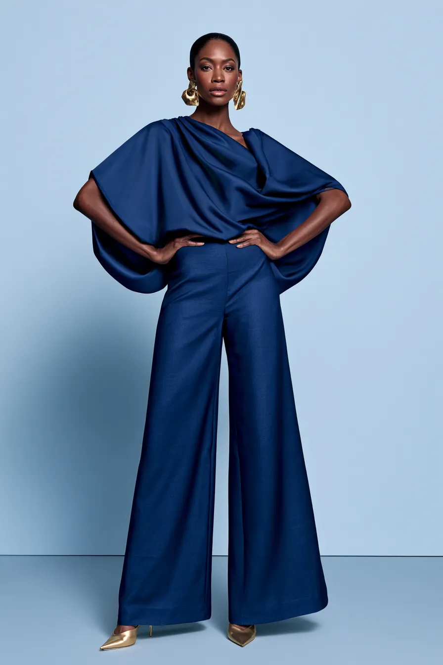 Wide-leg silk trousers and draped blouse — wedding guest outfit ideas for semi-formal occasions