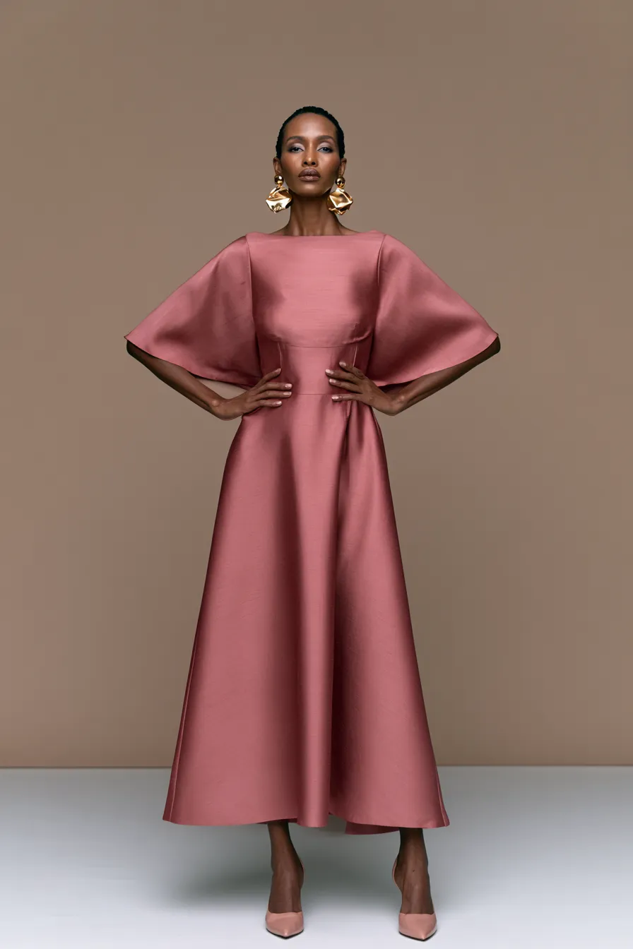 Silk A-line midi dress as an elegant wedding guest outfit for women over 40