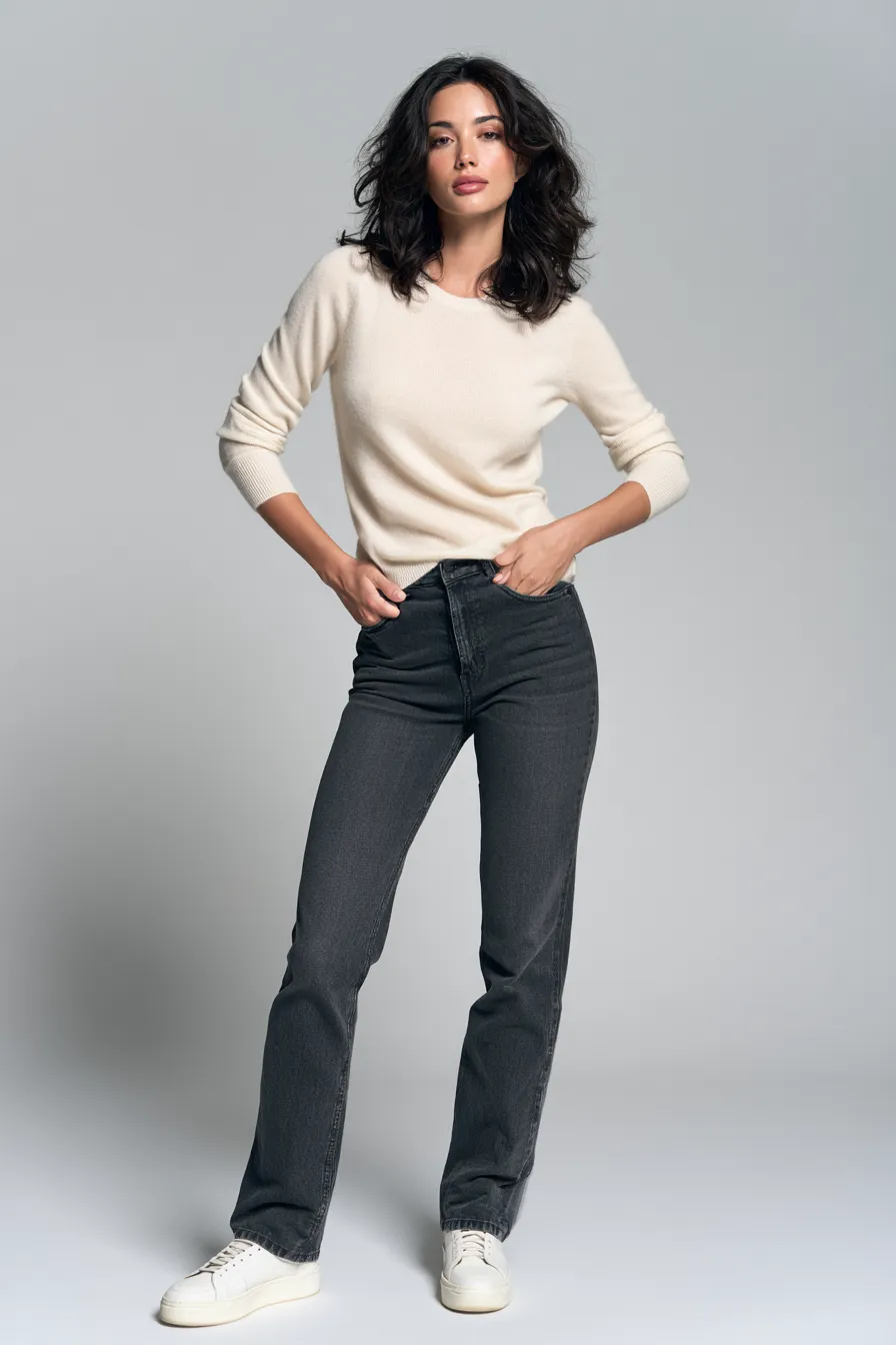 Capsule wardrobe casual essentials for women in their 30s cashmere sweater and dark jeans