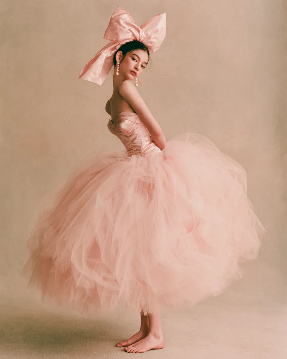 coquette aesthetic outfits blush satin corset tulle skirt bow hair pearl earrings