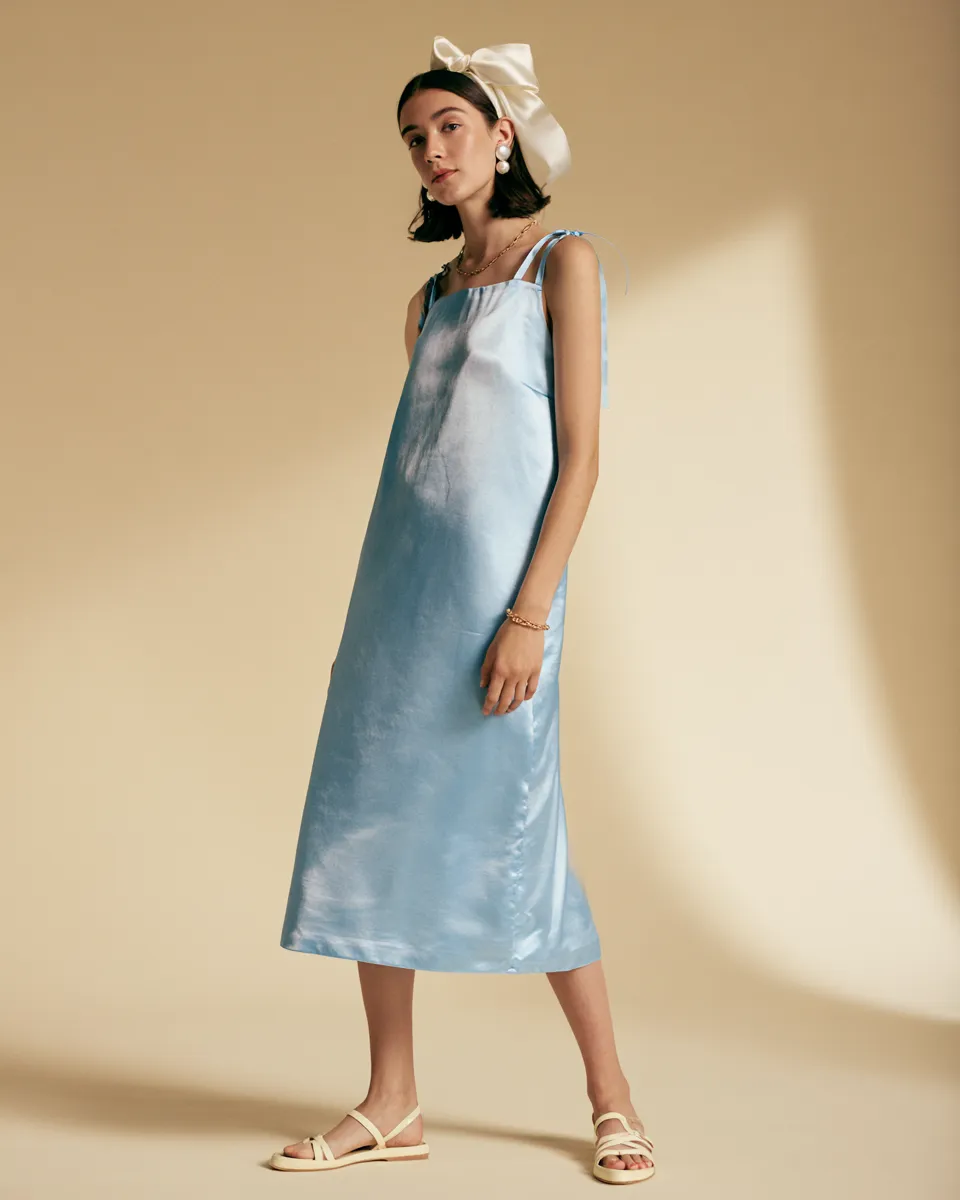 coquette aesthetic fashion look blue satin midi slip dress bow earrings gold chain