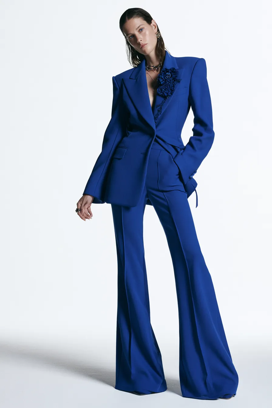 trendy blue clothing ensemble featuring accessory stacking and tailored silhouette