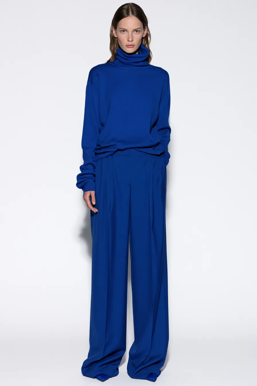 bold electric blue fashion outfit with monochrome cobalt layering