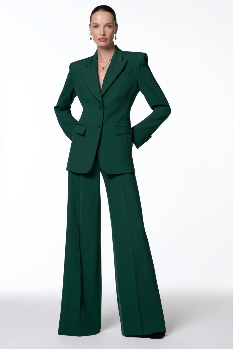 Trendy fashionable green power look modeled in professional studio setting