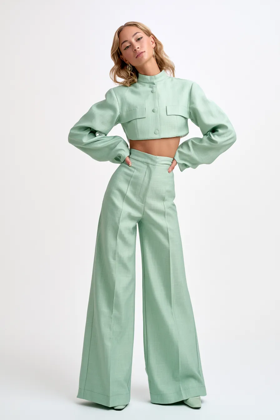 Fashion catalog photo featuring model in elegant mint green clothing ensemble