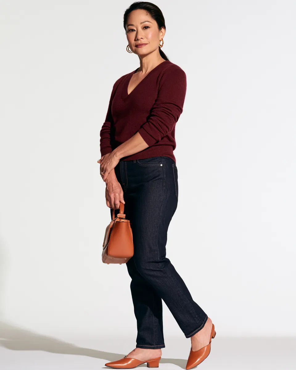 petite over 40 jeans outfit dark straight leg jeans V-neck knit mule heels editorial