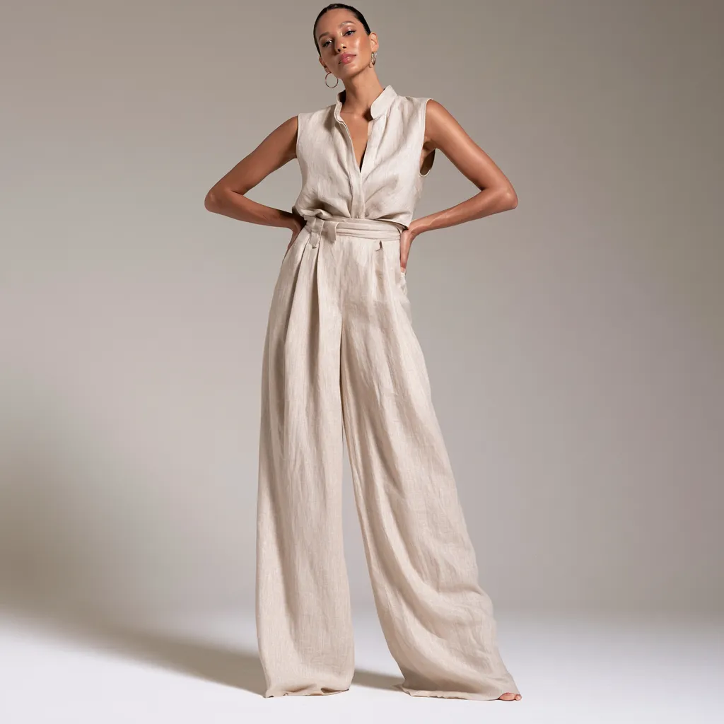 Full-length fashion catalog shot of a minimalist women's summer outfit idea for travel and everyday wear