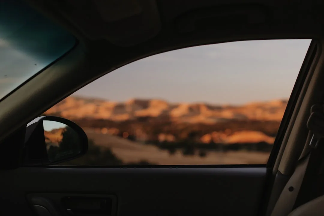 Professional ceramic window tint applied to car side windows showing heat reduction benefits