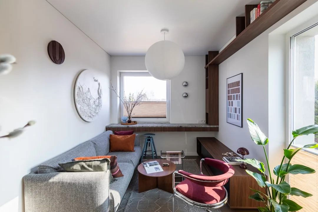 Modern micro-unit kitchenette integrated into bedroom wall space