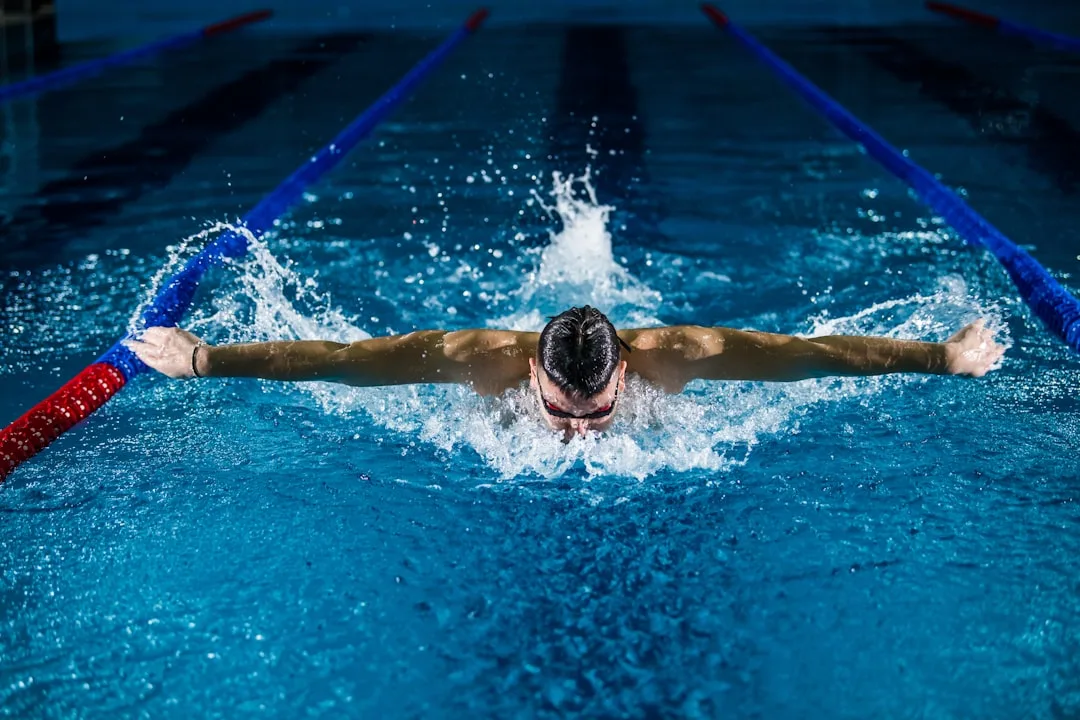 Woman performing low-impact strength training with water resistance in pool