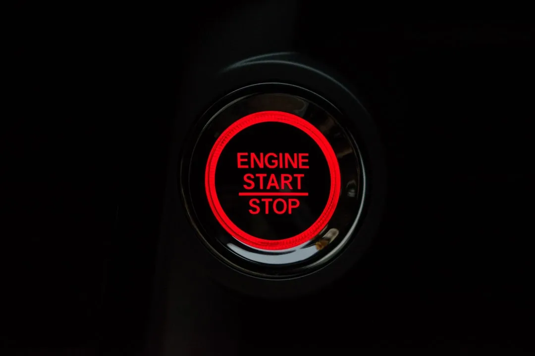 Close-up of smartphone app displaying remote vehicle start and climate controls