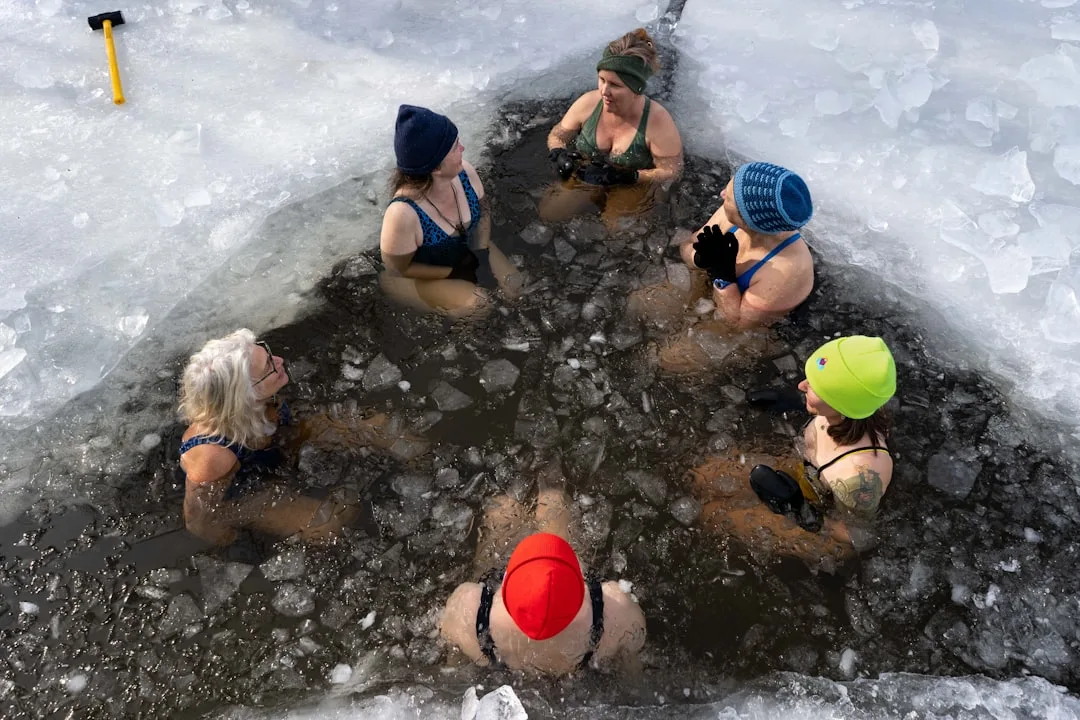 Close-up of thermometer showing cold water temperature during immersion session