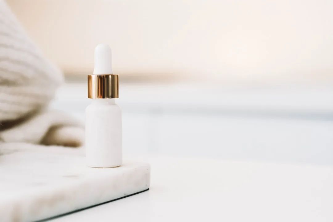 Five serum bottles arranged by viscosity from thinnest to thickest texture