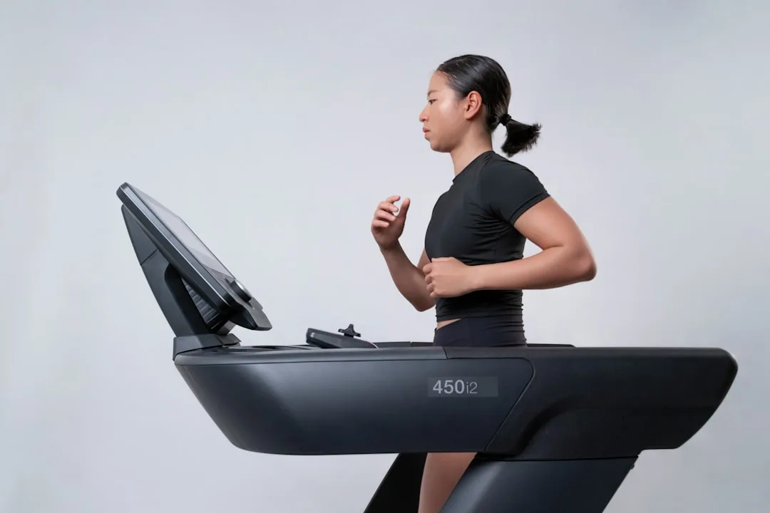 athlete performing slow controlled tempo strength training dumbbell press