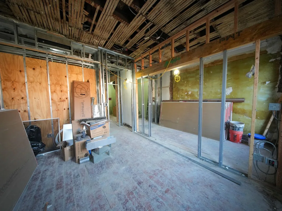 Finished basement interior walls with drywall, paint, and ambient lighting