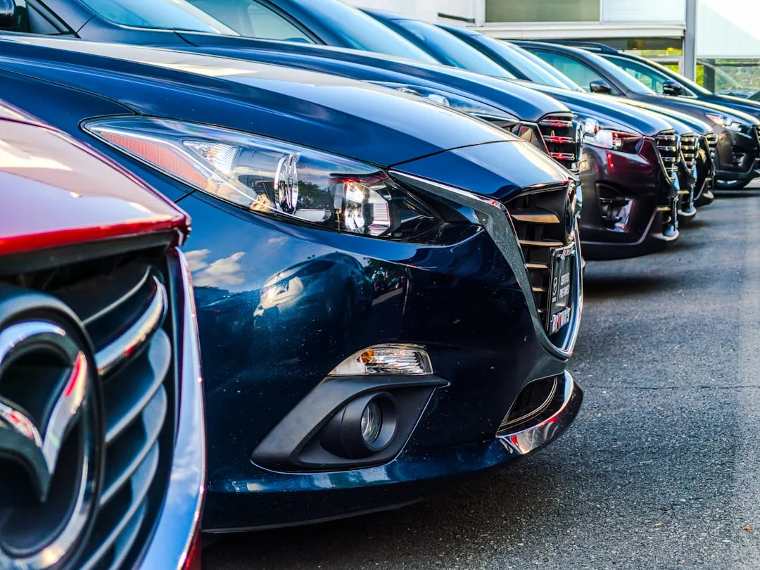 Buyer signing vehicle depreciation protection agreement at dealership