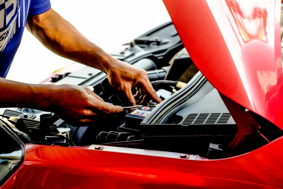 service advisor explaining bundled maintenance plan to car owner