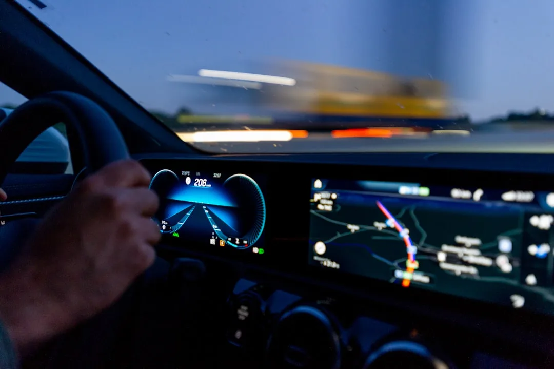 Connected car interior with touchscreen displaying live traffic and vehicle diagnostics