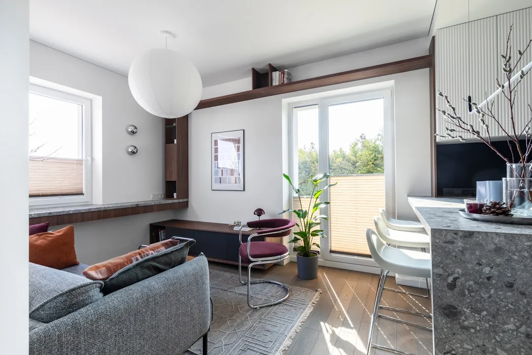 Compact micro-unit apartment with open floor plan and minimalist furniture