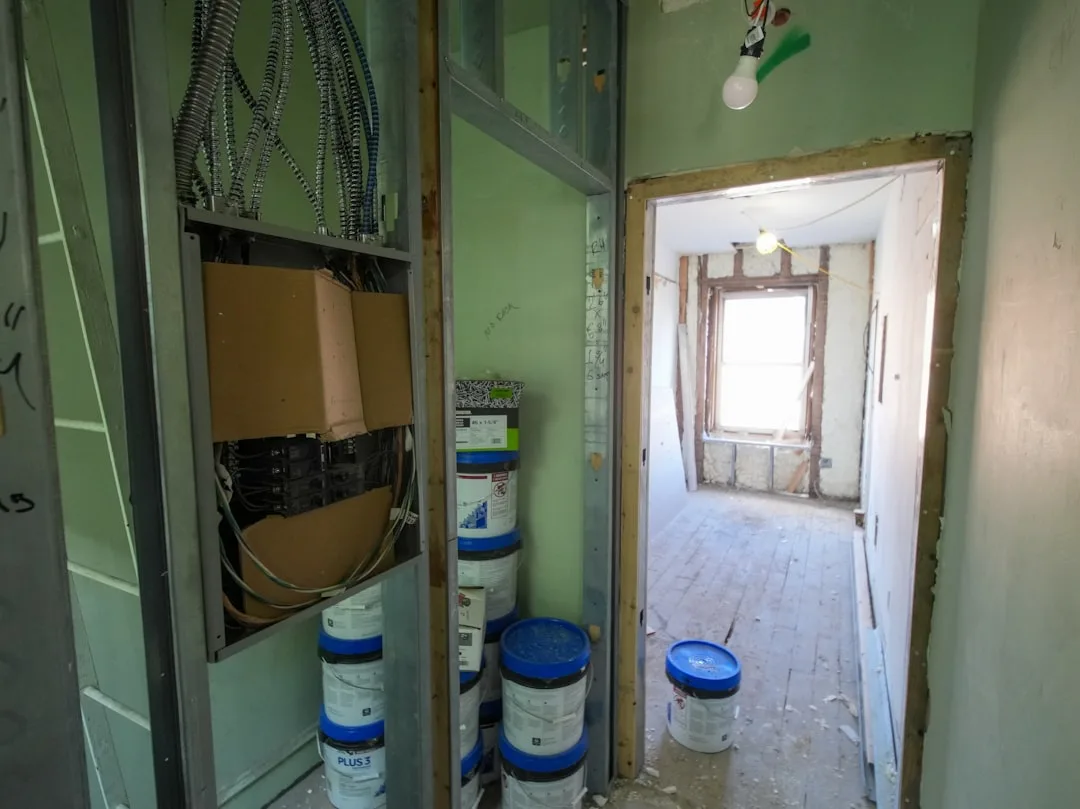 Close-up of sealed basement wall with moisture barrier before drywall installation
