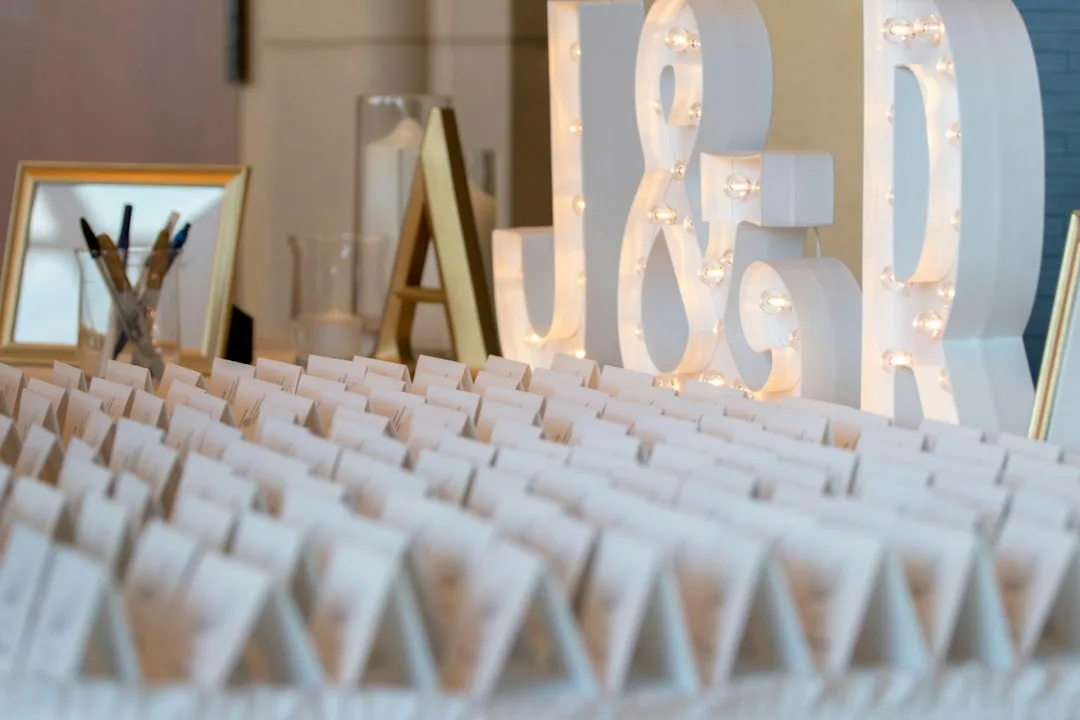Interactive digital wedding seating chart displayed on tablet with real-time guest updates