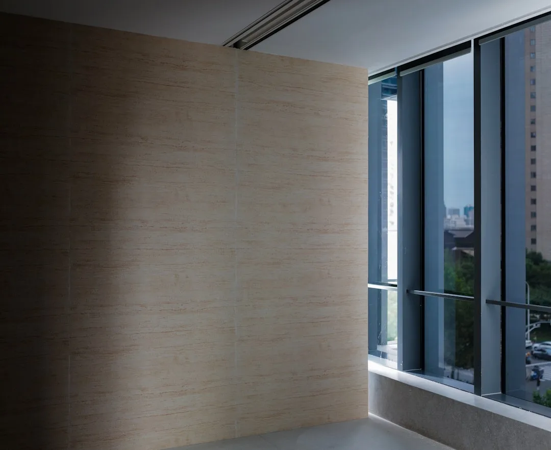 Modern living room with cork wall panels creating warm textured feature wall